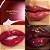 Gloss Labial R.e.m Beauty x Wicked: For Good Wicked Poppy Plumping Lip Gloss | Cor: Plum Petals | EDIÇÃO LIMITADA - Imagem 3