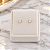 Brinco Baby Ponto de Luz- Ouro 16k-B643 - Imagem 1