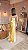 VESTIDO LONGO PRADA ALÇA FINA COM BRILHO DETALHE BUSTO FENDA LATERAL AMARELO MANTEIGA - Imagem 2