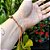 Pulseira Artesanal simples de Macramê com Pedra Natural Unakita em Fio encerado - Imagem 3