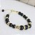 Pulseira de Ágata Preta e Ônix Natural com Hematitas Dourada e Detalhes Banhados a Ouro - Imagem 2