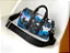 BOLSA LOUIS VUITTON KEEPALL BANDOULIERE 25 SUNSET MONOGRAM ECLIPSE - Imagem 2