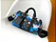 BOLSA LOUIS VUITTON KEEPALL BANDOULIERE 25 SUNSET MONOGRAM ECLIPSE - Imagem 1
