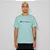 CAMISETA CHAMPION LIFE COLORS SCRIPT LOGO EMB NIMBUS GREEN - Imagem 1