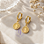 Brinco Argola Medalha São Bento no banho Ouro 18k - Imagem 3