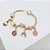 Pulseira Coração Berloques banho Ouro 18k - Imagem 3