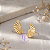 Brinco Leque banho Ouro 18k - Imagem 3