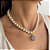 Colar Elegante com Pérolas em Vidro e Pingente Azul - Imagem 3