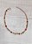 Pulseira moeda com pedra vermelha - Imagem 2