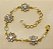 Pulseira flor de strass base ouro - Imagem 9