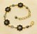 Pulseira flor de strass base ouro - Imagem 5