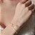 Pulseira estrela meteoro cravejada de zircônias folheada a ouro 18k - Imagem 2