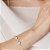 Pulseira de zircônia com 5 Corações folheada a ouro 18k - Imagem 2