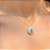 Colar gota bordada com cristal topázio azul e zircônia verde em prata 925 - Imagem 3