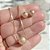 Conjunto colar e brincos esfera em banho de ouro 18k - Imagem 3