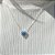 Conjunto coração cristal safira e zircônia azul em banho de prata nano silver - Imagem 2
