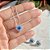 Conjunto coração cristal safira e zircônia azul em banho de prata nano silver - Imagem 3