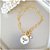 Pulseira dupla banhada em ouro 18k com elos de coração fecho boia e medalha divino espirito santo - Imagem 3