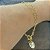 Pulseira dupla banhada em ouro 18k com elos de coração fecho boia e medalha divino espirito santo - Imagem 2