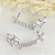 Brinco ear cuff em banho de ródio branco com gotas em cristal e zircônias brancas - Imagem 3