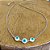 Choker em banho de ródio branco elos cartier e ollho grego - Imagem 3