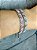 Pulseira fecho gravata em banho de ródio branco cravejada de zircônias com pedras fusion rosa - Imagem 2