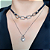 Choker em couro com elos em banho de ródio branco cravejado de zircônias cristais - Imagem 2