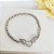 Pulseira de bolinhas banhada em ródio branco e coração com asas e zircônias - Imagem 3