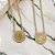 Colar relicário banhado em ouro 18k duas medalhas cravejadas de zircônias - Imagem 3