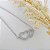 Pulseira banhada em ródio branco com corações vazados cravejados de zircônias - Imagem 3