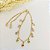 Pulseira banhada em ouro 18k com quadradinhos de zircônias coloridas - Imagem 3