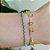 Pulseira banhada em ouro 18k com pequenas bolinhas verdes - Imagem 2
