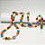 Terço Colorido Infantil com Medalhas de Santos e Crucifixo Ilustrado - 38cm - Imagem 3