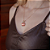 Blusa Couro Pelica Perfurada Zipper Marrom - Karine Daher - Imagem 3