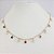 CHOKER FOLHEADO A OURO COM PENDURADOS EM PEDRINHAS COLORIDAS E PÉROLAS - Imagem 1
