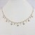 CHOKER FOLHEADO A OURO COM PEDRINHAS EM ZIRCÔNIA E ESTRELINHAS - Imagem 1