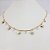 CHOKER FOLHEADO A OURO COM PEDRINHAS EM ZIRCÔNIA E CORAÇÕES - Imagem 1