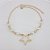 PULSEIRA ADULTO FOLHEADO A OURO COM PÉROLAS E ESTRELA - Imagem 1