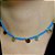 CHOKER CRISTAIS AZUIS E MEDALHINHAS. - Imagem 2