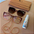 Kit Verão 🌴 - Clipon Maya nude rosado + Cordão + Limpa lentes – por R$199,00 - Imagem 1