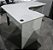 Mesa de Escritório em L Usada 1,20m x 1,60m Tampo 25mm Base Pé Painel - Imagem 1