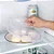 Tampa Protetora para Micro-ondas com Saída de Vapor – Ideal para Cozinhar sem Bagunça - Imagem 9