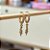 Argola Luiza Serpente Craveja com Micro Zircônias em Banho Ouro18k - Imagem 2