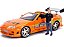 Miniatura Toyota Supra Velozes e Furiosos com boneco Brian - 1/24 - Jada Toys - Imagem 1