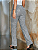 Calça Perna Flare cintura alta Houndstooth PU - Imagem 4