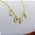 Pulseira de Bolinhas com Pingente escrito LOVE - Banhado em Ouro 18k - Imagem 2