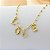 Pulseira de Bolinhas com Pingente escrito LOVE - Banhado em Ouro 18k - Imagem 4