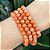Pulseira de Calcita laranja esfera 6mm - Imagem 1