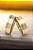 Par de Aliança com 14 gramas de Ouro Amarelo 18K com 1 Diamante Natural. - Imagem 4