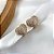 Argola CORA coração cravejado com zirconia cristal folheada a ouro - Imagem 1